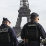  Police officers patrol the Trocadero plaza near the Eiffel Tower in Paris last year.