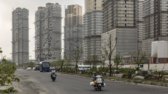 Construction of unfinished properties with enough floor space to cover three-fourths of Manhattan is at risk.