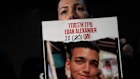 Yael Alexander holds a poster of her son, Edan, who was taken hostage by Hamas militants on October 7, 2023.