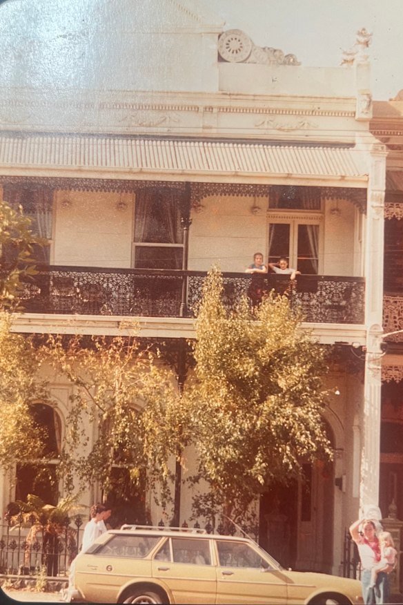 A young Besha Rodell and her housemate Sarah pictured on the balcony of the terrace house their families shared in Brunswick.
