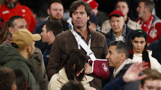 Outgoing AFL CEO Gillon McLachlan among footy fans earlier this season.