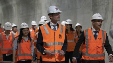 Premier Dominic Perrottet and Stokes inspect the progress on the Barangaroo Metro Station and the completed railway track under the Sydney Harbour in October. 