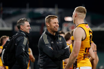 Sam Mitchell is all smiles after the match.