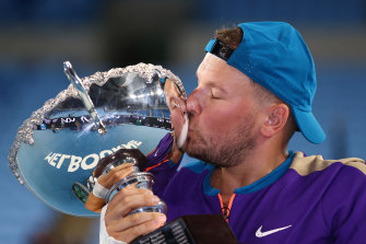 Dylan Alcott celebrates after winning his seventh consecutive Australian Open titlelast year.