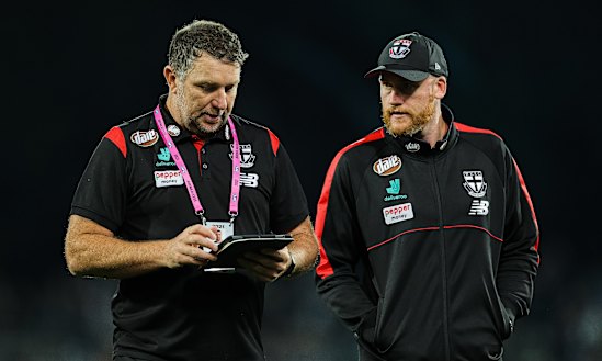 Jarryd Roughead, pictured right with Brendon Lade in his St Kilda days, is no longer at the club.