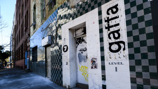 The karoake bar's chequered facade was cleaned of rubbish on Monday morning.