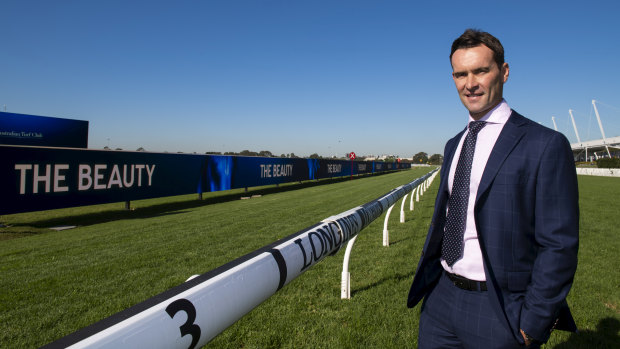 Australian Turf Club executive general manager of infrastructure and strategy Piers Thompson in front of the new LED screen at Rosehill.