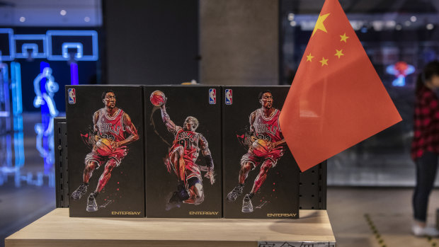 A Chinese flag placed alongside NBA merchandise in Beijing.
