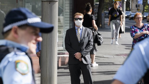 Harry Little (wearing mask) arrives at court this week.