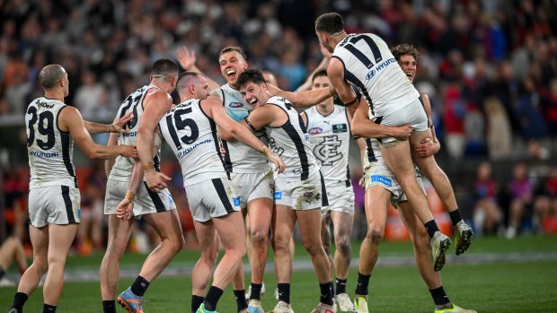 The Blues celebrate as a team.