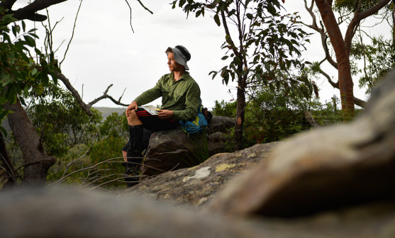 Tristan White, 27, the communications officer of NSW Rogaining, pictured in the Berowra Valley National Park in Sydney. 