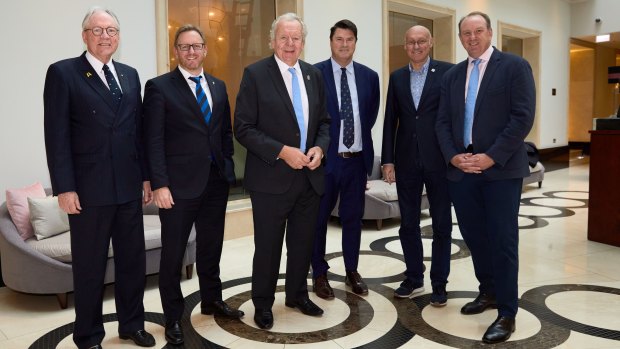 Bid advisory chair Rod Eddington, left, with World Rugby and Rugby Australia officials.