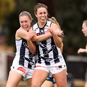 Chloe Molloy celebrates a goal for the Pies.