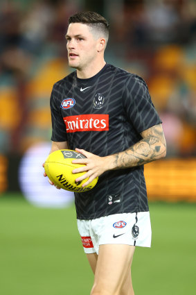 Crisp warms up for Collingwood prior to the clash with the Brisbane Lions.