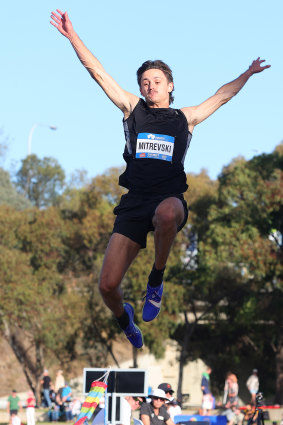 Victorian Christopher Mitrevski wins the men’s long jump - and a place on Australian Olympic team - at the national athletics championships in Adelaide.