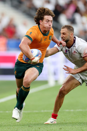 Mark Nawaqanitawase taking on Georgia during the Rugby World Cup in September.