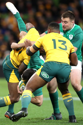 Dangerous: Koroibete earned a yellow card for this tackle on Rob Kearney. 