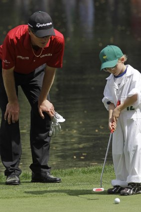 Flashback: John Senden watches son Jacob putts at Augusta in April 2010.