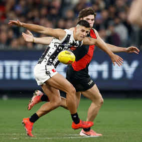 Bomber Sam Durham took the task of shadowing Nick Daicos literally.