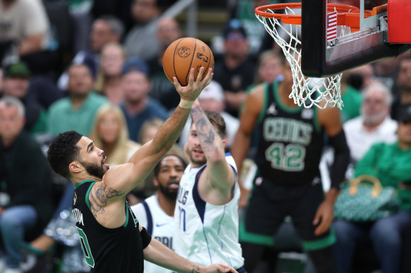 Jayson Tatum #0 of the Boston Celtics shoots the ball against the Dallas Mavericks.
