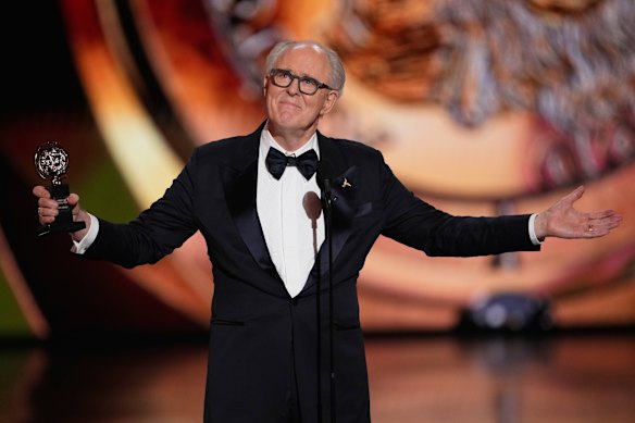 John Lithgow accepts the award for best performance by a leading actor in a play.