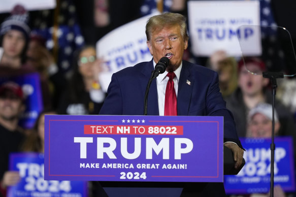Former president Donald Trump speaks during a campaign event in Manchester, New Hampshire.