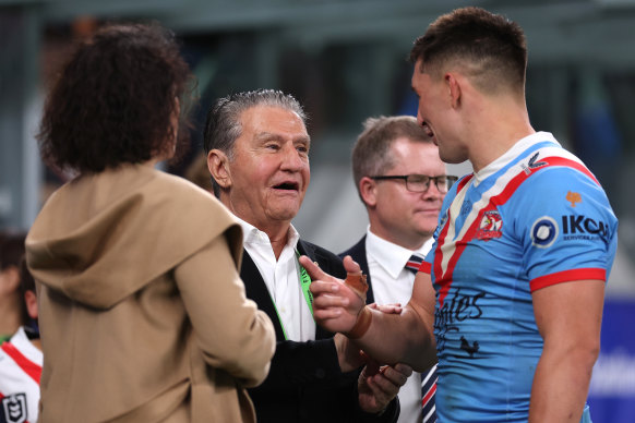 Roosters chairman Nick Politis talks to Victor Radley after the match.