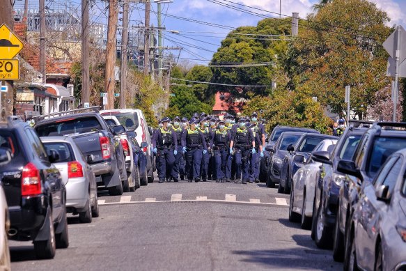 Police close off a suburban street in Melbourne’s inner-east.