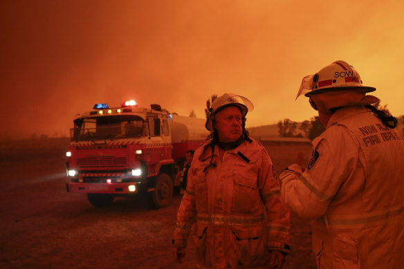 RFS firefighters getting ready to defend properties in Bumbalong on Saturday.