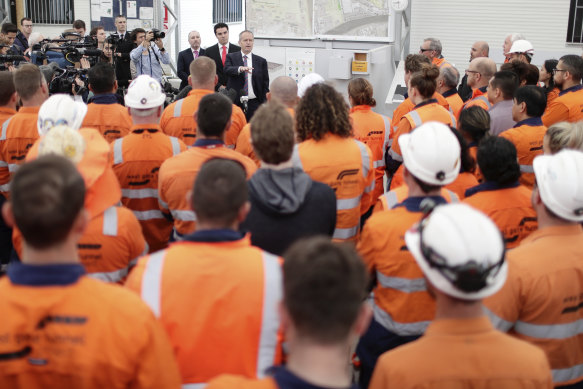 Then-opposition leader and former AWU boss Bill Shorten speaks with workers on the West Gate Tunnel during the 2019 election campaign.