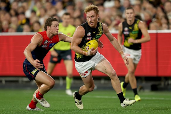 Nick Vlastuin in action against the Demons.