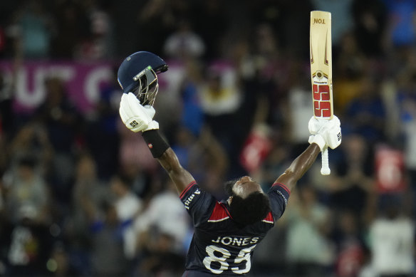 USA batsman Aaron Jones celebrates his team’s opening match victory against Canada after hitting 10 sixes.