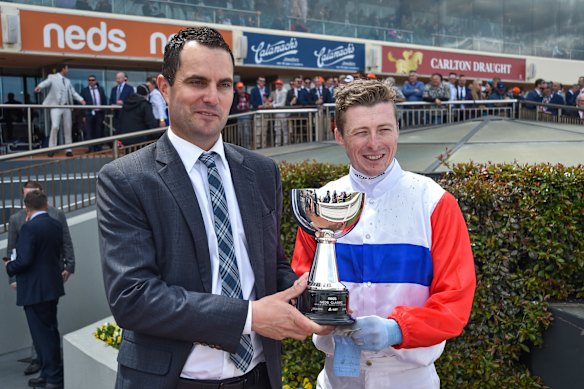 Andrew Forsman with jockey Harry Coffey at Caulfield in 2022.