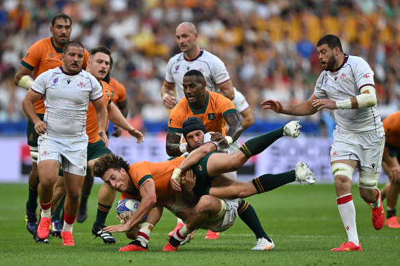Mark Nawaqanitawase is tackled by Georgia’s Tornike Jalagonia during last year’s Rugby World Cup.