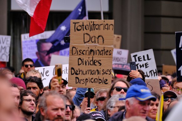 Protesters gather to listen to speakers on Saturday.