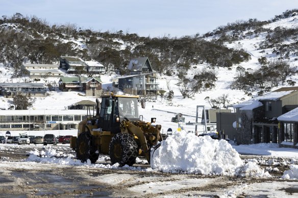 The carpark at Smiggin Holes, in the Snowy Mountains, is cleared of snow after recent snowfall.