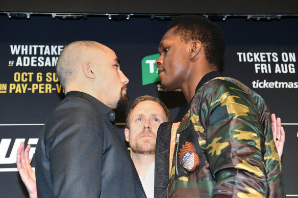 Battle lines drawn: Israel Adesanya (right) faces off with Robert Whittaker (left).