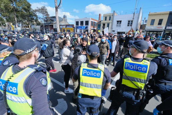 Police clashed with protesters at the Queen Victoria Market on Sunday