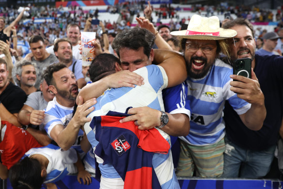 Agustin Creevy of Argentina celebrates victory with members of the crowd at full-time.