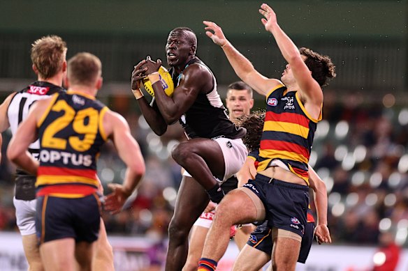 Aliir Aliir marks for Port Adelaide in a powerful display.