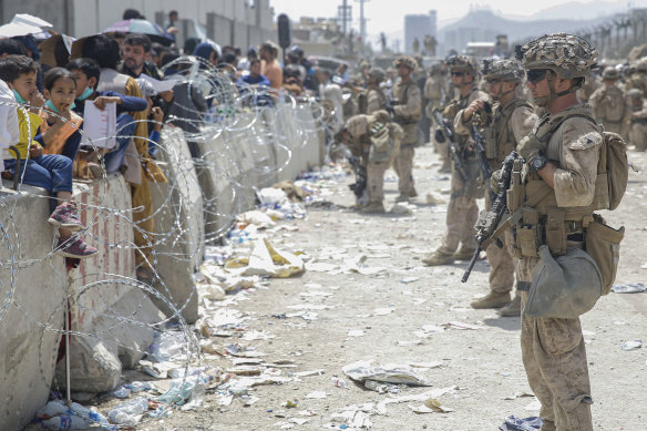 US troops line the airport perimeter at Hamid Karzai International Airport in Kabul.