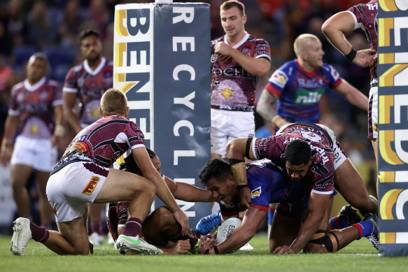 Daniel Saifiti crashes over for a late winner in Newcastle on Sunday.