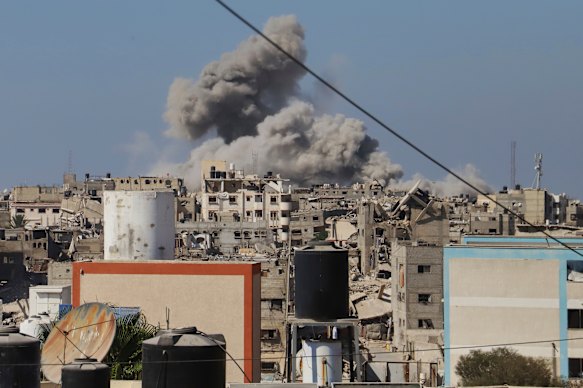 Smoke rises to the sky following an Israeli army airstrike in Khan Younis, in the Gaza Strip.
