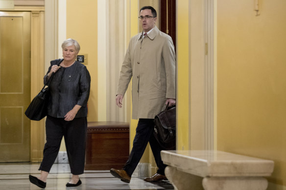 Former top national security adviser to President Donald Trump, Tim Morrison, arrives for a closed door meeting.