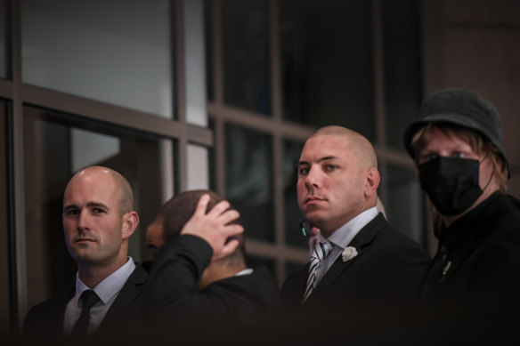 Thomas Sewell (far left) arriving at court with his supporters this week.