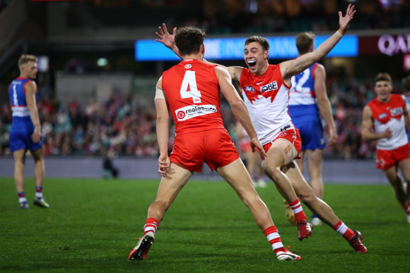 Ryan Clarke celebrates after kicking a goal.