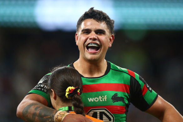 Mitchell embraces South Sydney ball girl Aliyah after a crunch conversion last week.