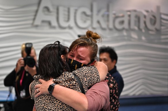 An emotional reunion at Auckland airport yesterday. 