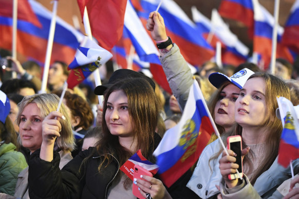People gather in the Red Square in Moscow on Friday.