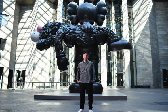 The seven-metre tall sculpture GONE by KAWS at the NGV.
